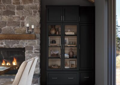 Living room with built-in white cabinets and shelves surrounding a central fireplace.