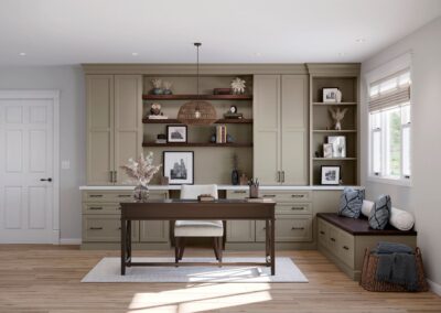 Home office with gray built-in cabinets, wood desktop, and recessed lighting.